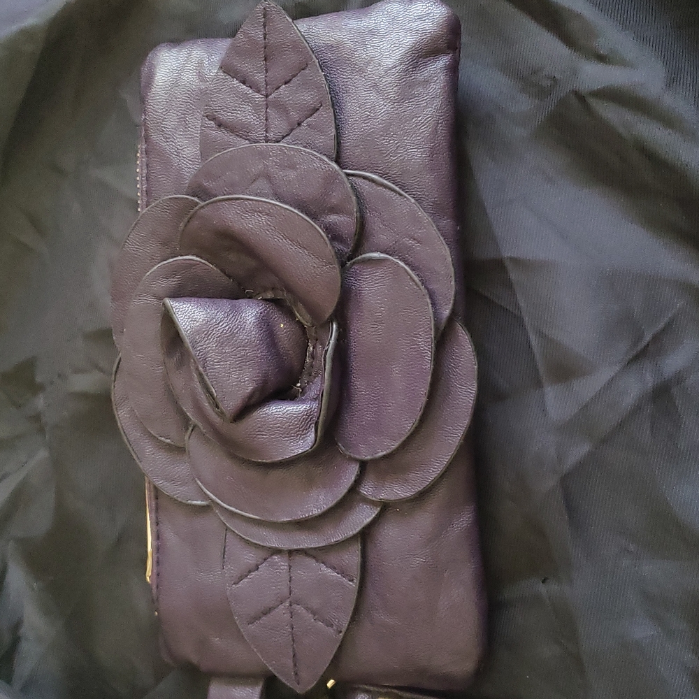 Faux leather clutch.